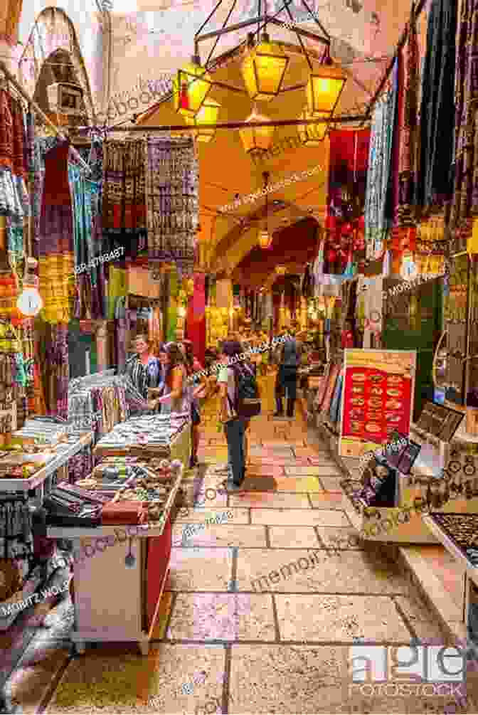 A Narrow Alleyway In The Old City Of Jerusalem, Lined With Shops And Stalls. Top 12 Things To See And Do In Jerusalem Top 12 Jerusalem Travel Guide