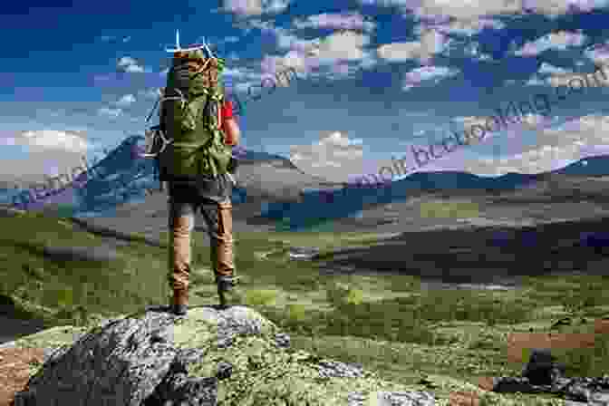 Hiker Traversing A Rugged Mountain Trail With A Fully Loaded Hiking Backpack Carrying Essential Gear. The Ultimate Hiker S Gear Guide Second Edition: Tools And Techniques To Hit The Trail