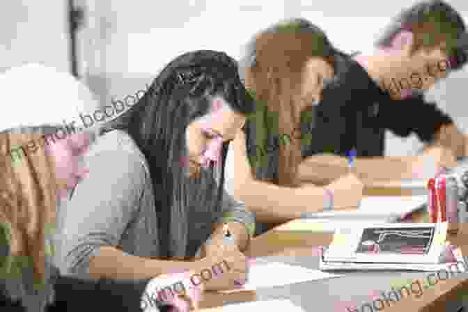 Student Taking Notes During A Lecture Study Skills For Business And Management Students (Successful Studying)